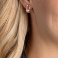 Una stud earrings